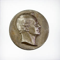 Prägestempel (Avers) zur Medaille Alexander von Humboldt, auf sein Werk Kosmos