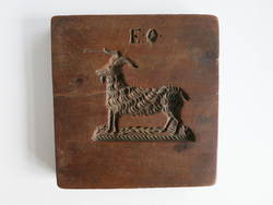 Zweiseitiger Holzmodel mit den Darstellungen eines Schafbocks und eines Reiters