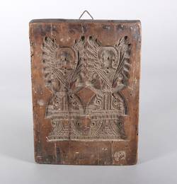 Zweiseitiger Holzmodel mit Darstellungen von Engeln und Ornamentik;